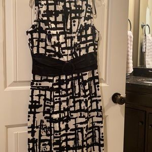 Knee length, sleeveless dress.